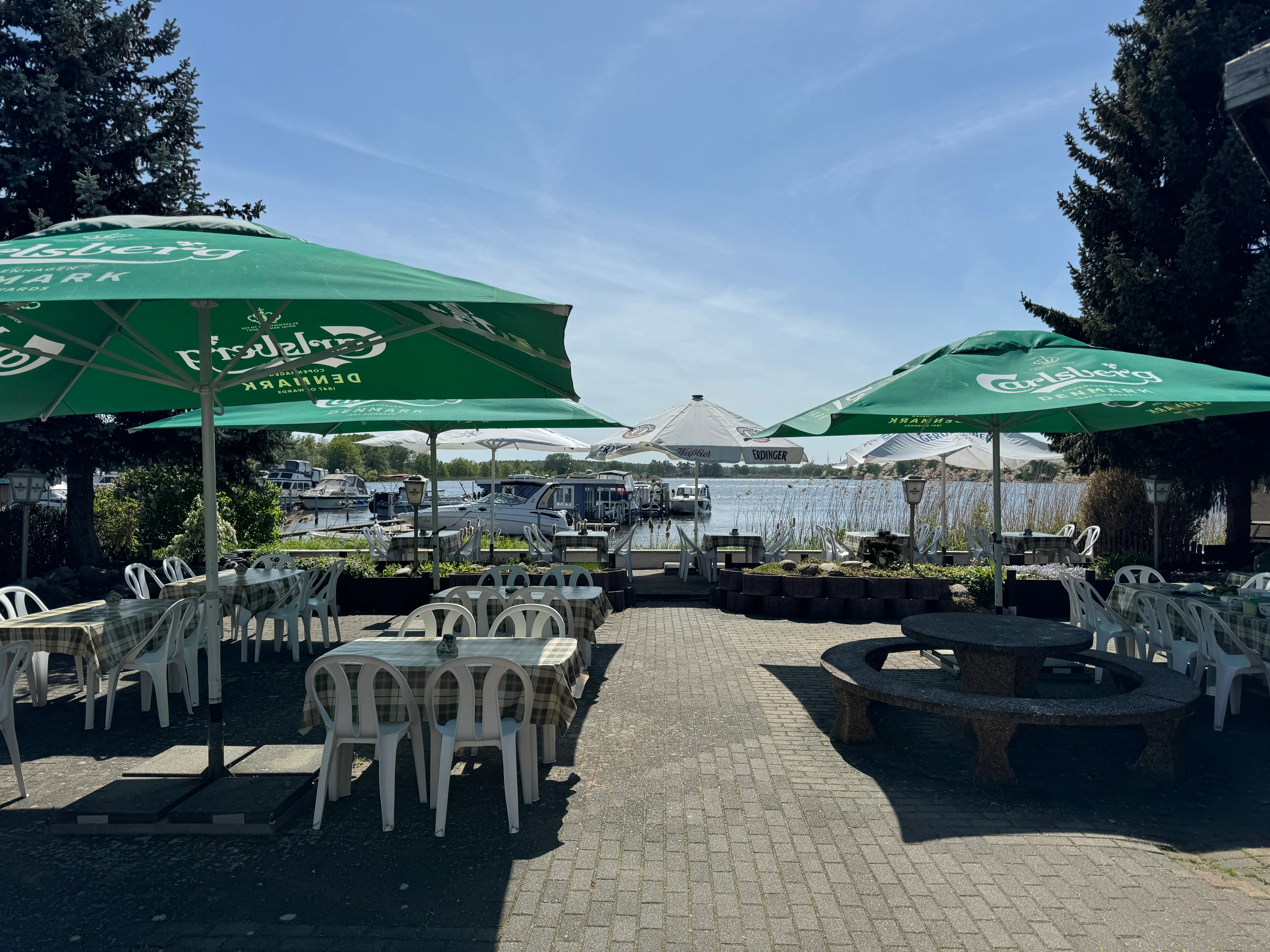 Looking across the terrace to the Havel with boats at the jetty